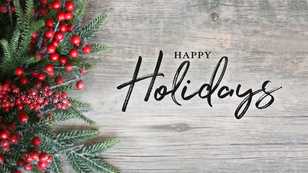 Happy Holidays Text with Holiday Evergreen Branches and Berries Over