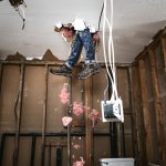 Contractor Man Doing Home Improvement and Demolition
