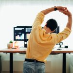 Man working at standing desk