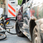 Accident Car Crash With Bicycle On Road
