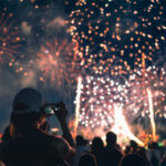 Girl watching a firework display